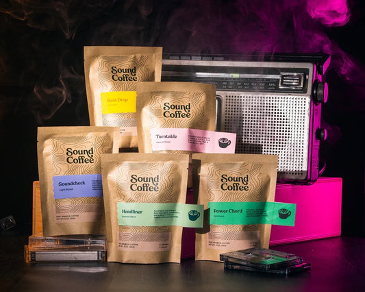 Sound Coffee signature blend sampler with assorted coffee bags on a studio background