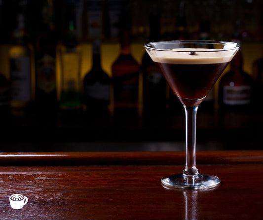 Espresso martini with creamy foam on a bar, showcasing Sound Coffee's cocktail inspiration.