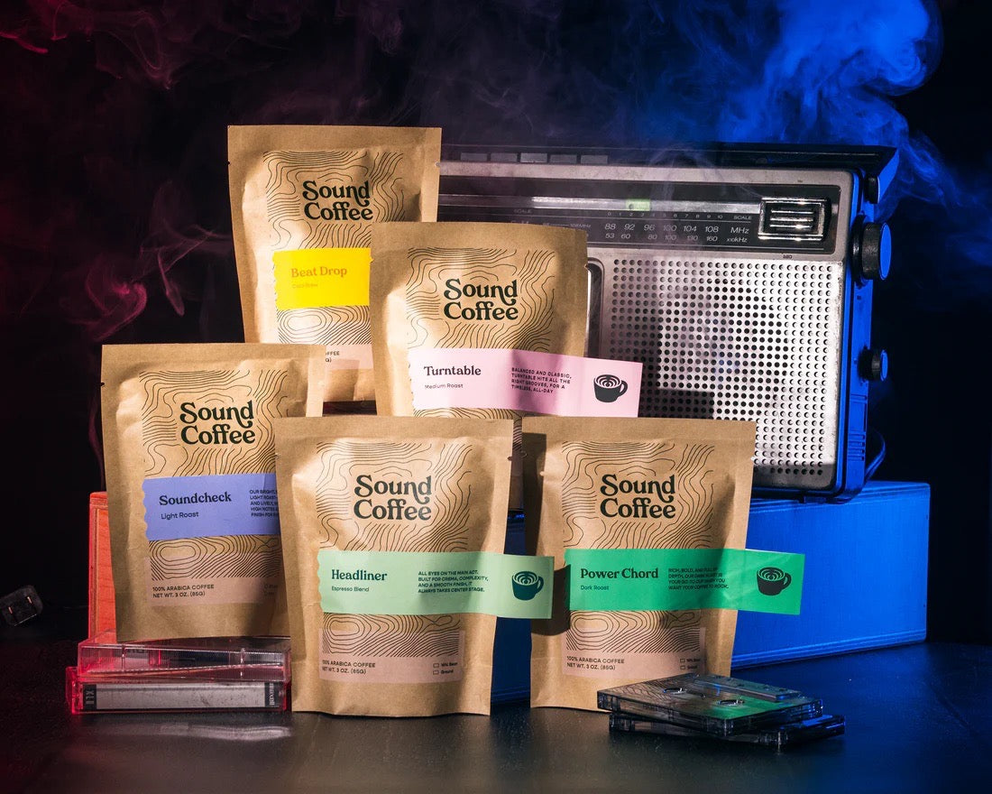 Sound Coffee signature blend sampler with assorted coffee bags on a studio background