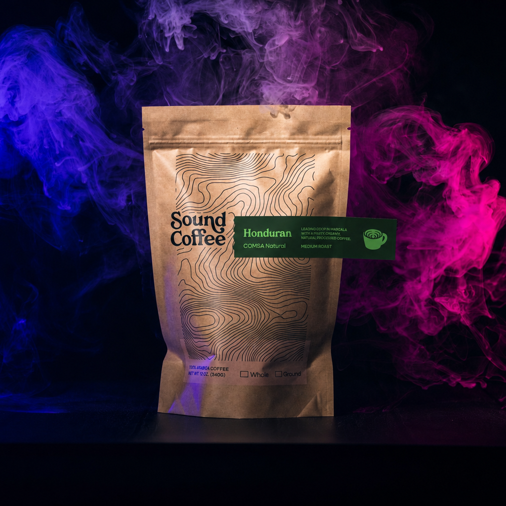 Brown coffee bag with 'Sound Coffee' branding on a dark background with colorful smoke effects